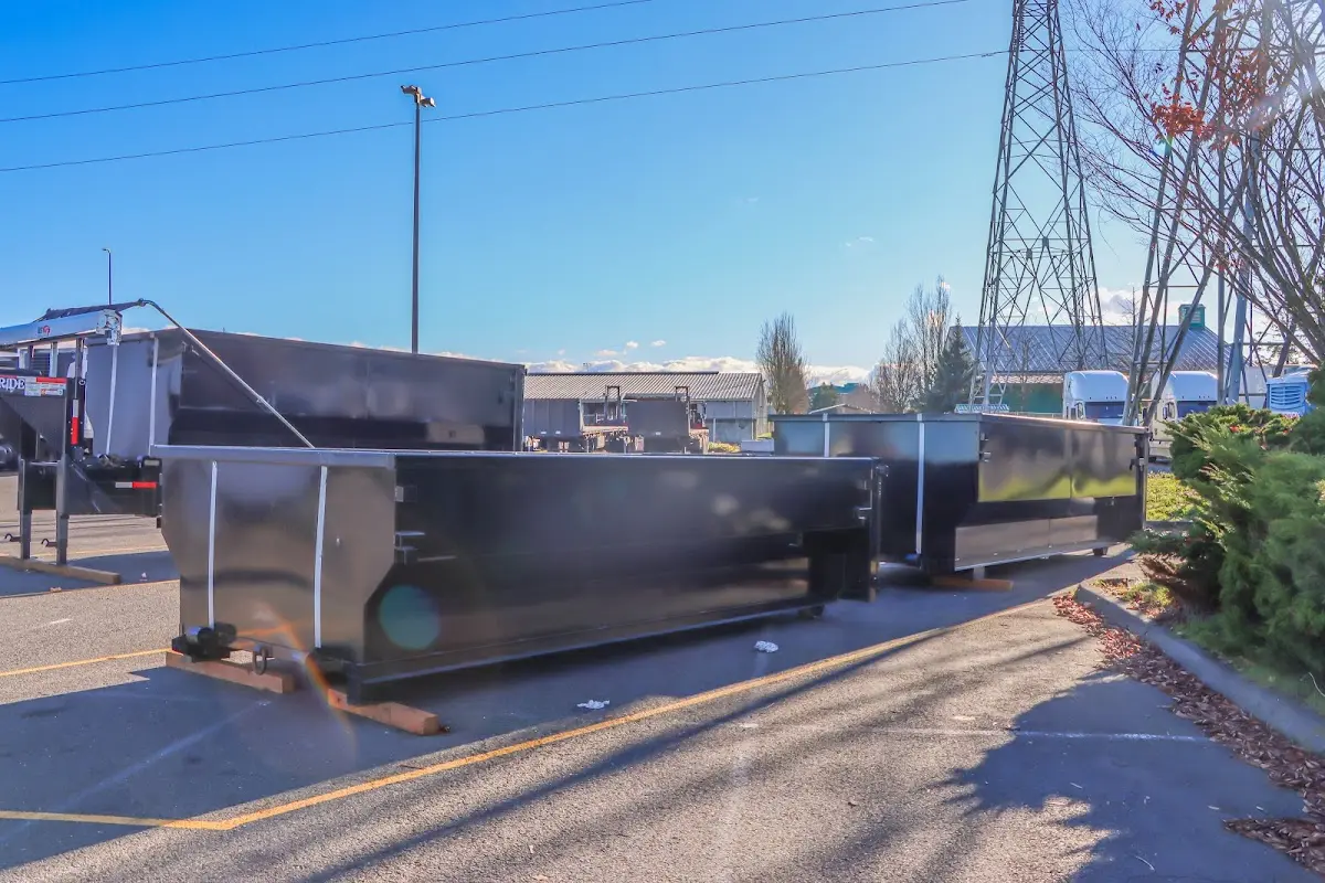 Roll-off dumpster ready for waste disposal at job site for Residential Dumpster Rental in Webster